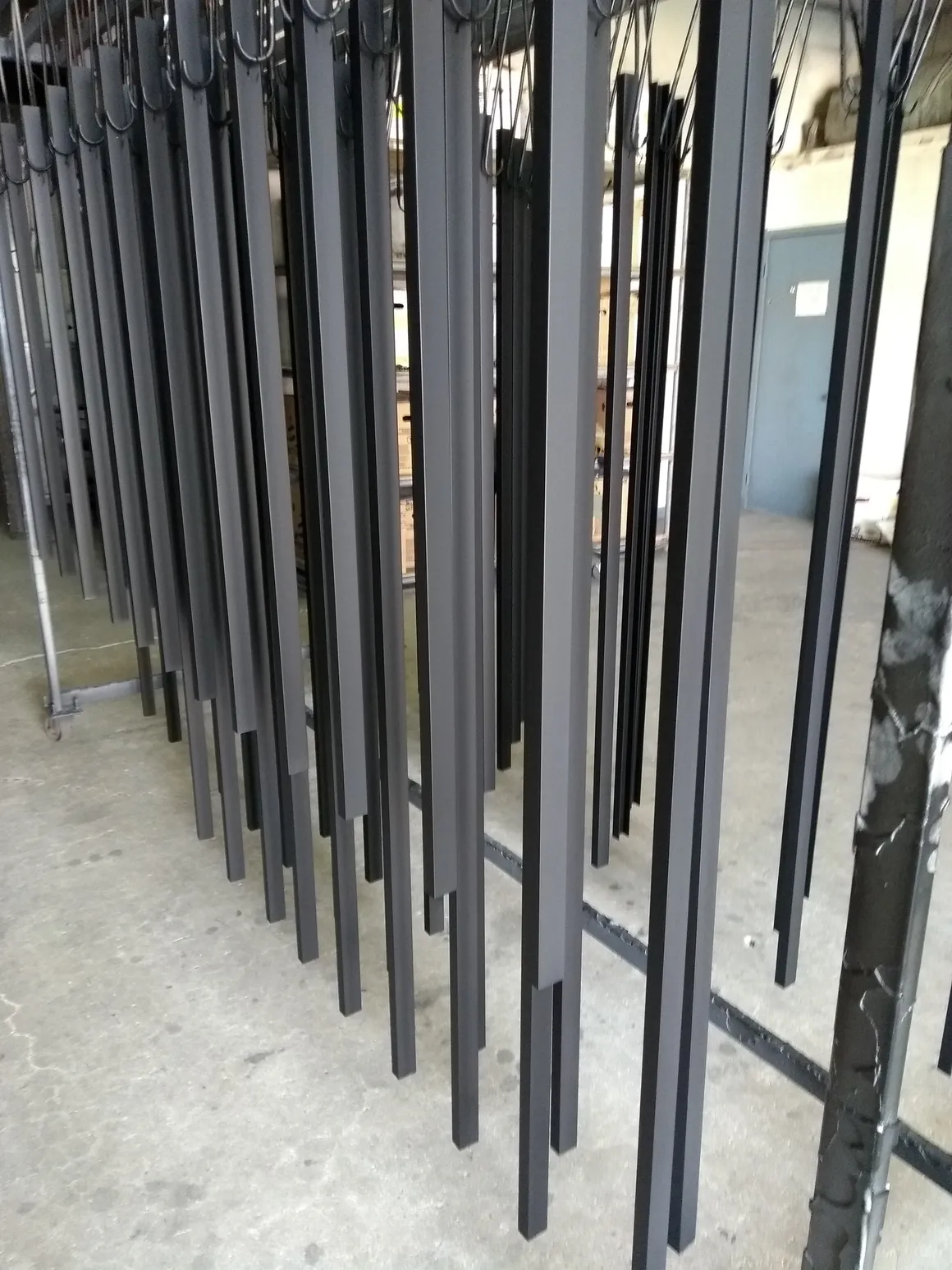 black metal bars hanging black metal bars hanging